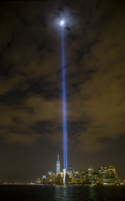 gordonovan:  Tribute in Light The Tribute in Light is seen beaming above the New York City sky from the Staten Island Ferry and lower Manhattan on Wednesday, September 9, 2015.  The Tribute in Light is an art installation of 88 searchlights placed next
