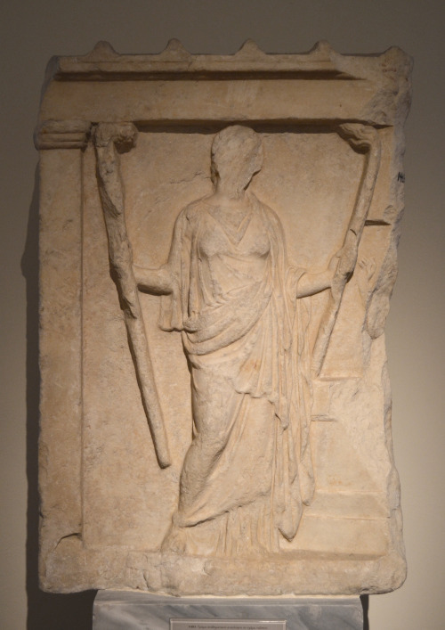 athens-archaeological-museum: Fragment of a votive relief in the shape of a shrine, found in Piraeus