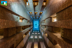 A 60 meter high tower. You don't look at the ceiling, but the bottom of a 27.000 liter watertank. It provided the workers with running water, which was a novelty at that time.