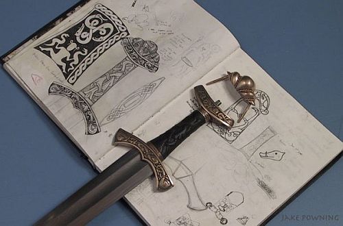 art-of-swords:Handmade Swords - Vardhllokur (Spirit Song)Maker: Jake PowningMedium: steel, oak, bitc
