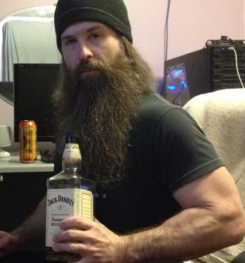 stardogchampion:  A couple pics from today.  Checking out what my hair looks like pulled back and having a whiskey and beer kind of night. 