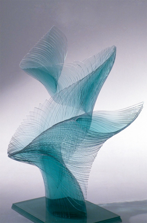 itscolossal:Artist Niyoko Ikuta Uses Layers of Laminated Sheet Glass to Create Spiraling Geometric S