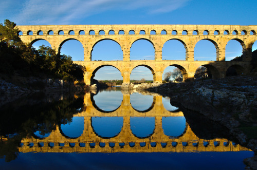 ancientart: Pont du Gard: a Roman aqueduct in France, constructed about 19 BCE. This technical and a