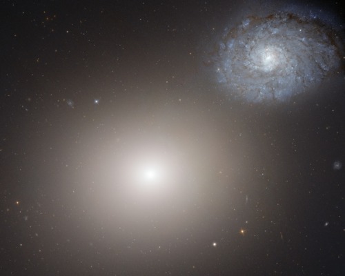 Elliptical M60, Spiral NGC 4647 Image thanks to NASA, ESA, Hubble Heritage Team (STScI/AURA)
