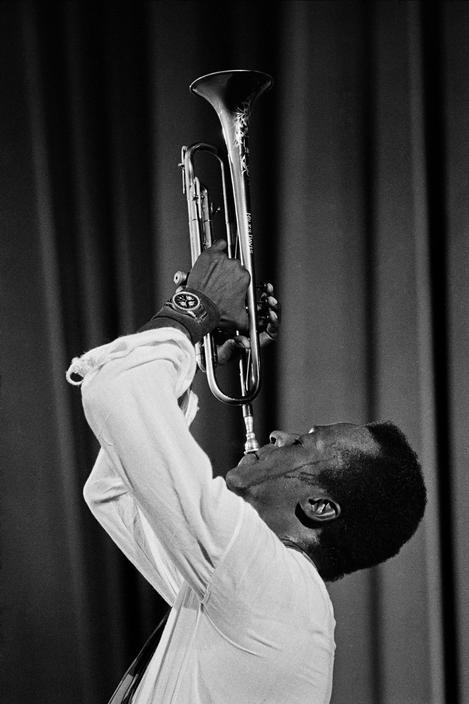  Guy Le Querrec FRANCE. Paris. 8th arrondissement. US trumpet player Miles DAVIS at the Salle Pleyel concert hall. 1969. 