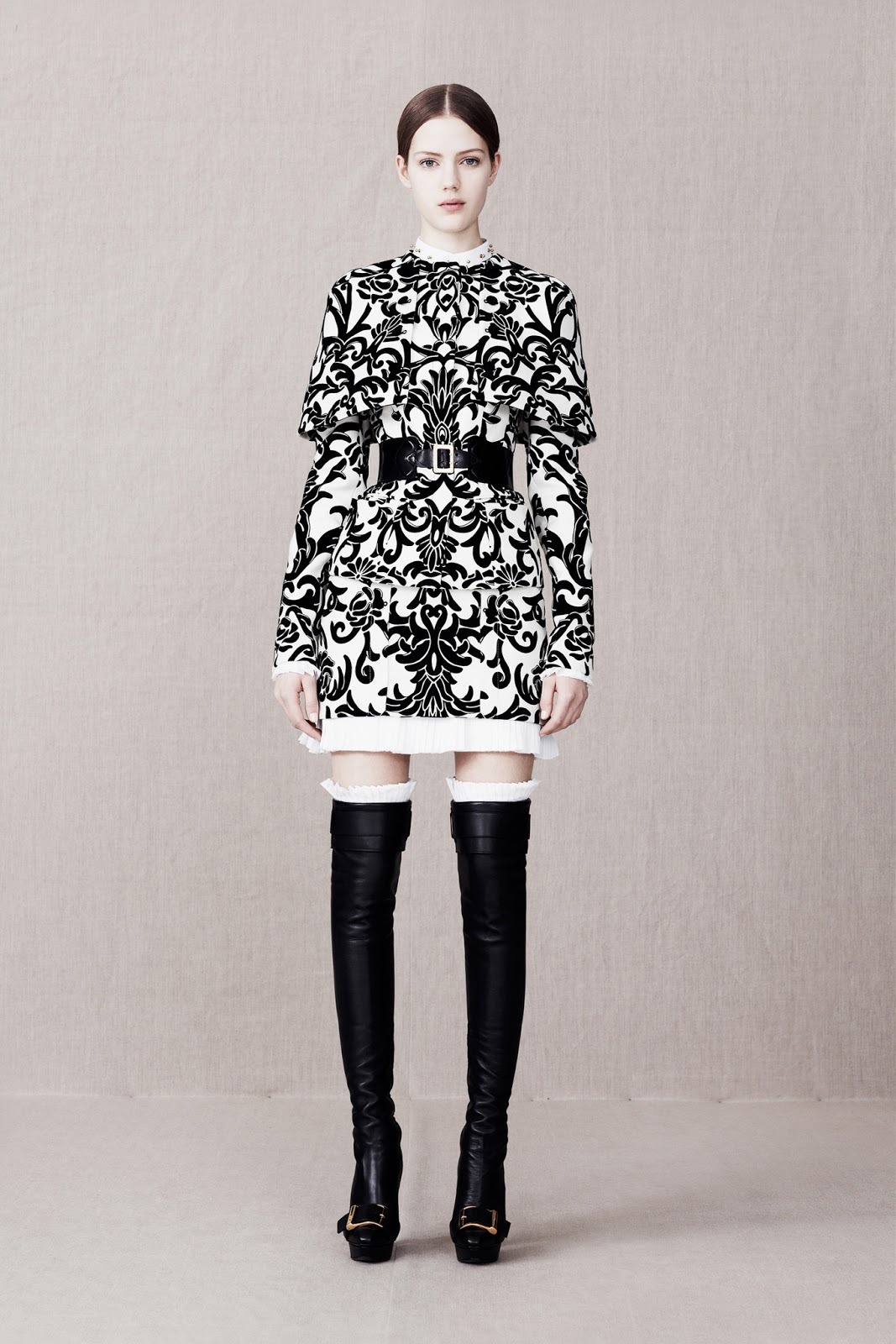 gothiccharmschool:  The black &amp; white coat! Lots of interesting, pretty designs