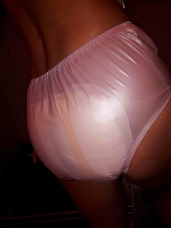   My first time in plastic pants with a stuffer (8 pics)I never