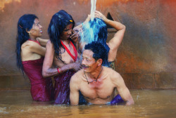   Nepali Tamang people at a hot spring, via