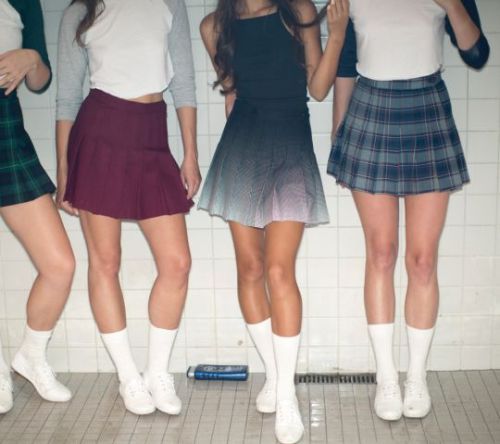pleatedminiskirts - Lovely row of skirts from American Apparel.