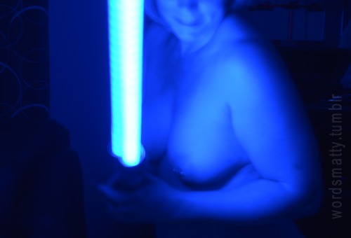 More lightsaber fun.  I like how she is making the sinister face while holding the blue one.