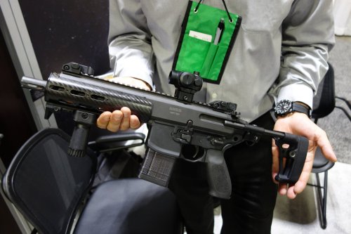 45-9mm-5-56mm:  awesomeness2:  thedepthcharger:  Sig Sauer MCX. It is operated by a dual short stroke piston gas tappet system with the recoil spring assembly in the upper, so no buffer tube is needed. There will be an integral suppressor available,