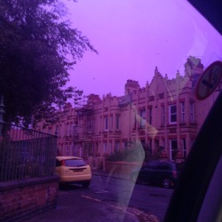 cluts:  a taxi with purple windows