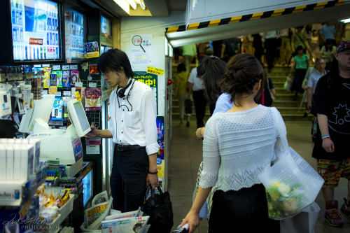 Making a quick purchase, Shinjuku station