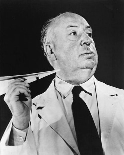 weirdvintage:  Alfred Hitchcock with paper