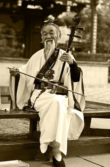 thetravelsofching: Tongli musician, China