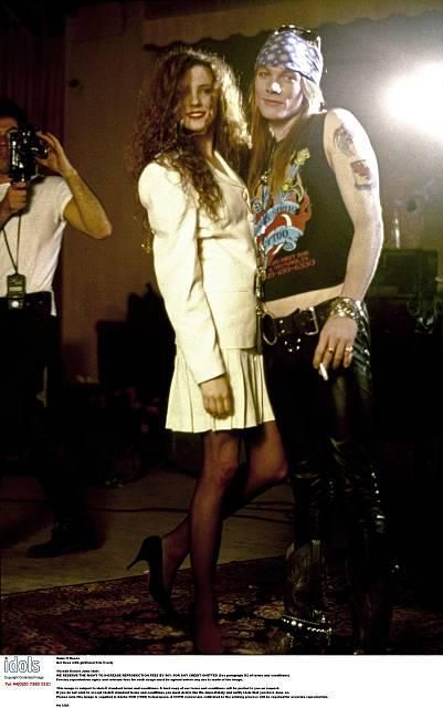 ladies of the band — blackros78: Axl Rose and Erin Everly during the...