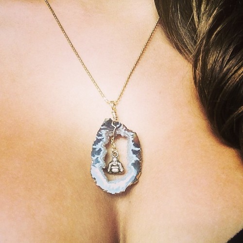 New necklace! Oco Geode slice with a happy little Buddha charm in the center Opens the mind and allo