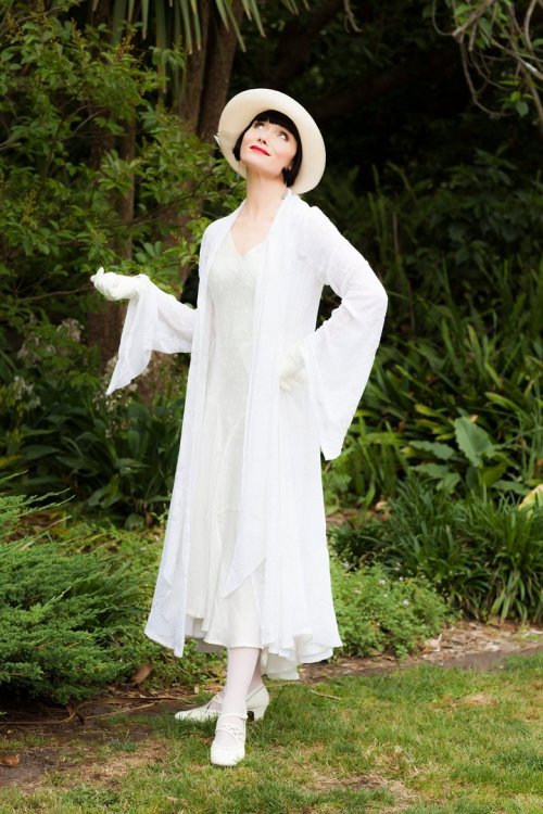 Get some tennis white’s with a true 1920s vintage dress from Adored Vintage. 