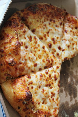 raininq:  i follow back :)  Making me hungry again yummy pizza