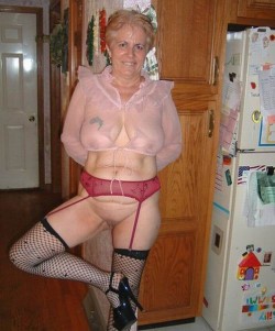 Here is a sexy granny posing in lingerie!Find