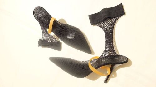 lacollectionneuse:fishnet heels with industrial rubber strap • helmut langUS $125.00