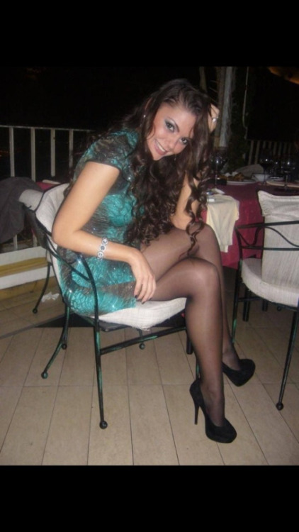 amateur girl in black sheer pantyhose and heeled pumps