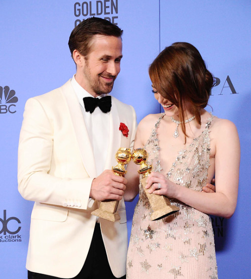 ryangoslingsource:  Ryan Gosling, winner of Best Actor in a Motion Picture - Musical or Comedy for ‘La La Land,’ and actress Emma Stone, winner of Best Actress in a Motion Picture - Musical or Comedy for ‘La La Land,’ pose in the press room during