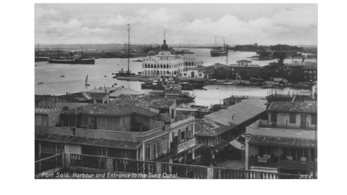 Port Said. Harbour and entrance to the Suez. The posh white building would be The Oriental Commercia