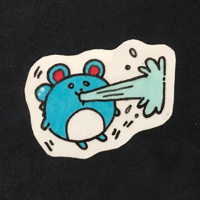 photo of a sticker depicting a marill shooting water out of its mouth