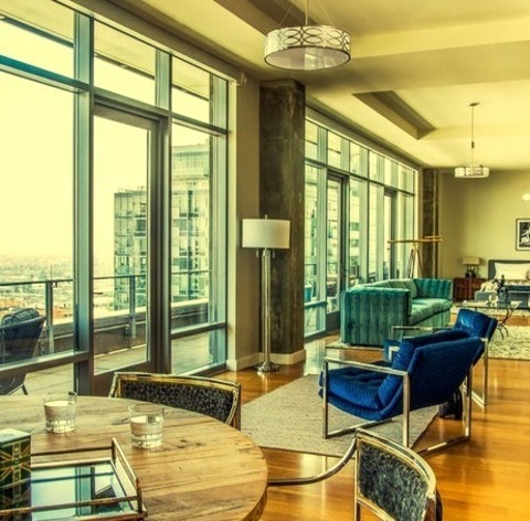 Great Room Dining Room Los Angelesa Large Stylish Great Room With A Medium Tone Wood Floor With A Brown
