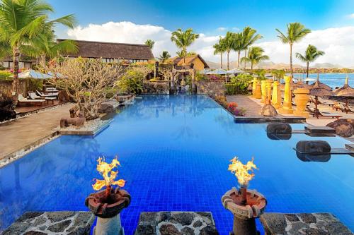 forbes-life:  8 Outrageously Gorgeous Hotel PoolsFloating in any body of water is pretty dreamy, but today’s hospitality  designers have found more and more ways to elevate the humble hotel  swimming pool into a spectacular work of art. The most beautiful