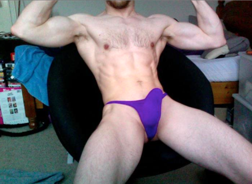 manthongsnstrings:  stringpassion:  randy9bis:  Hot in his bulging purple thong  :-)  Belle grosse queue dans ce string !  So much hotness going on
