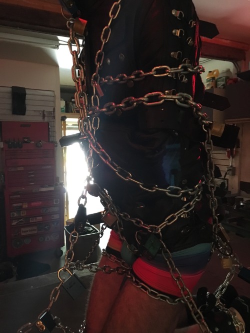 seabondagesadist:  Begin with a really cute boy in really cute rainbow underwear, add a straightjacket and as many chains and locks as you can get your hands on. This is a recipe for a really hot heavy bondage moment… 😈😈😈  Special thanks Jockbound