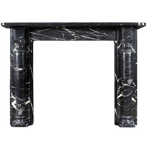 A Striking Black With White Veined Nero Marquina Marble Fireplace. The Jambs With Tapering Half Round