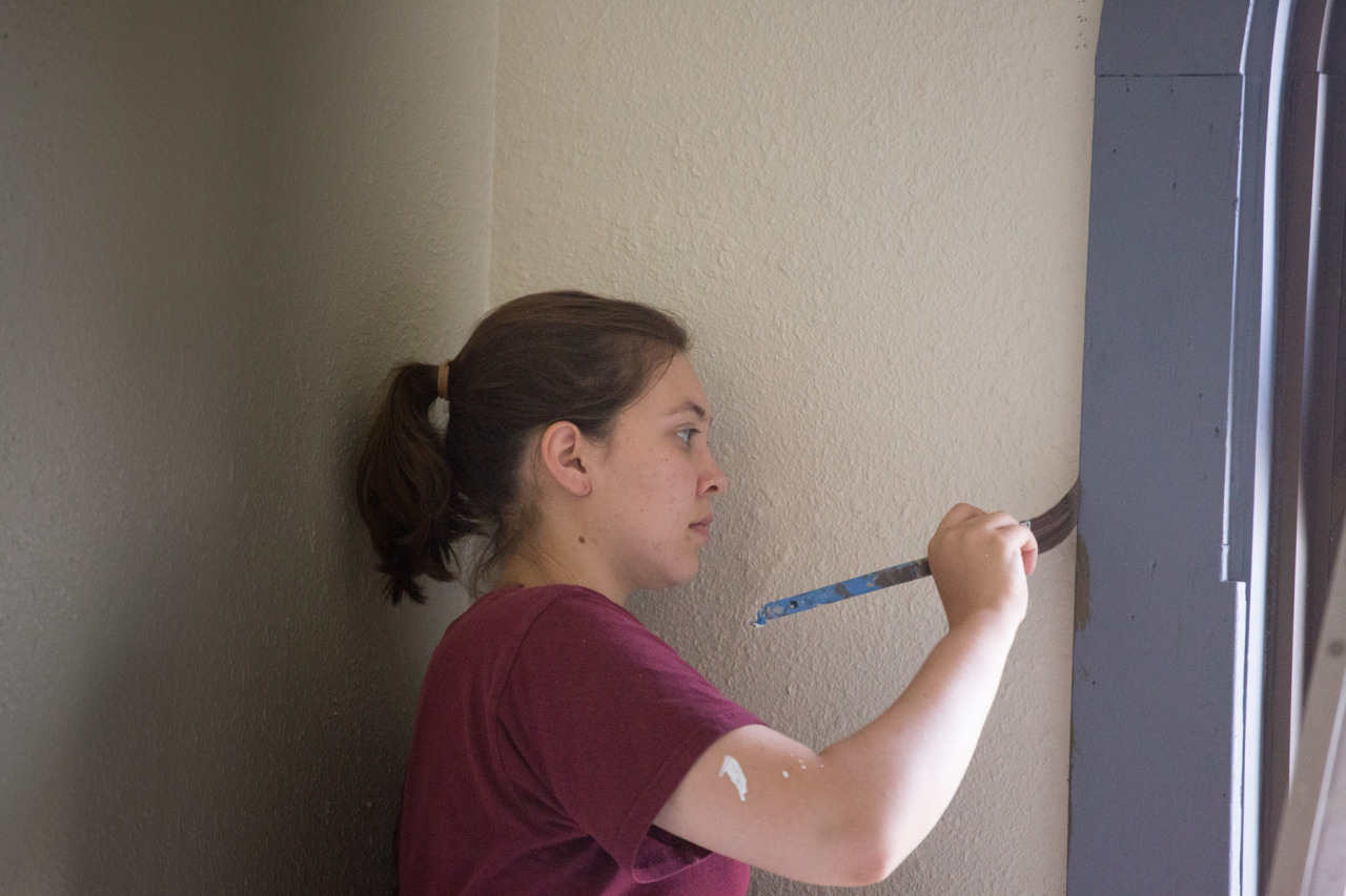 Student paint crew working in George Davis Hall.