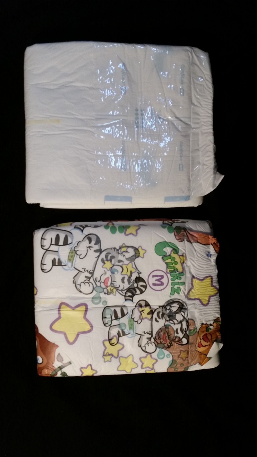 diaperboyares:  Wearing two diapers. Feels really thick :D