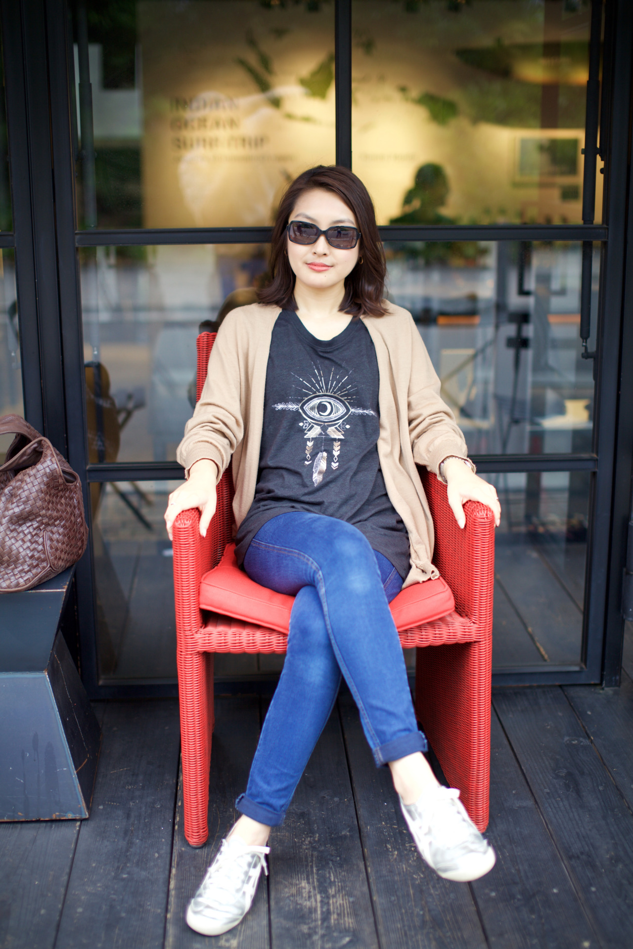 <p>Mysterious lady in red chair.</p>