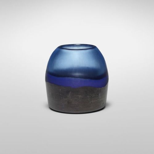 Lot 55: Thomas Stearns. Lunare vase. c. 1961, incalmo glass with partially carved surface. 4¼ dia x 