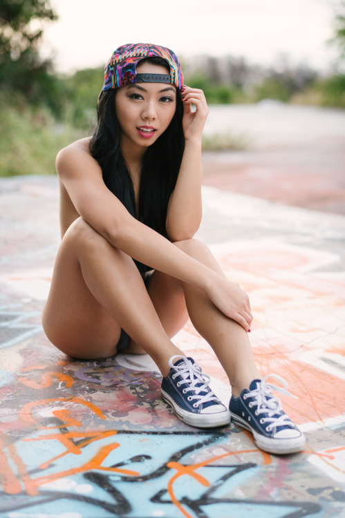 Hot Asian girl in sneeks. adult photos