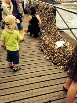 a-little-yellow-duck-feather:  Breaking news from Paris! The Pont des Arts, famous because of the large amount of love locks which were placed on its fences by thousands of couples… began to collapse due to the high weigh of these love locks. Paris