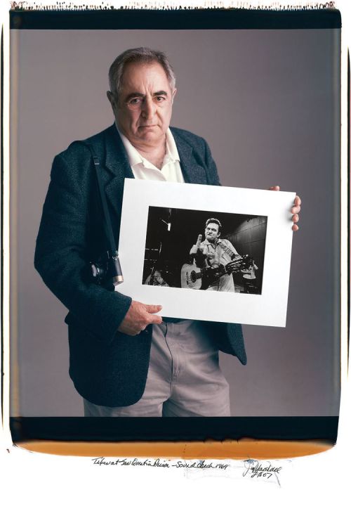 archatlas:  Behind Photographs Tim Mantoani Incredible project where a photographer and his most famous images pose together gathered in the book Behind Photographs: Archiving Photographic Legends. “Today, when Tim’s not shooting on assignment, he’s