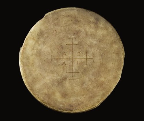 irisharchaeology - This elaborately decorated wax disc is known...