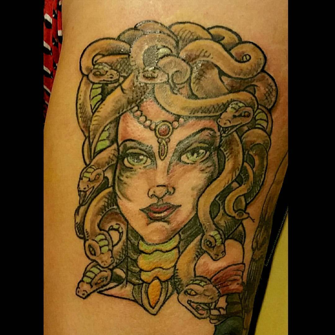 Medusa portrait tattoo done on the thigh, sketchy