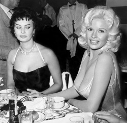 oldhollywoodcinema:  Sophia Loren and Jayne Mansfield photographed at Romanoff’s (1957)“Paramount had organized a party for me. All of cinema was there, it was incredible. And then comes in Jayne Mansfield, the last one to come. For me, that was when