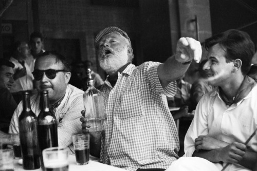 Ernest Hemingway with some orders in the bar