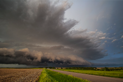 nubbsgalore:  yield to oncoming mesocyclones. photos by caleb elliott from tornado alley. 