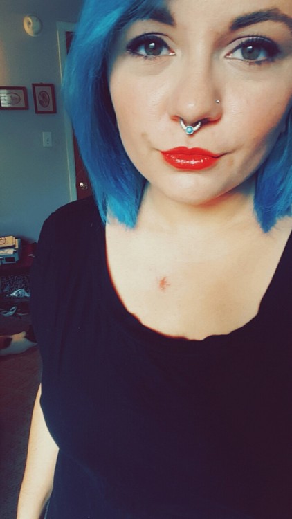 Red lips are so much more dramatic now with blue hair