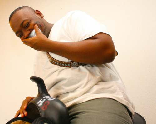 pixelspeaks:  Laughing at the bullies is one way to repel the haters. Demarcus Marks is pictured here on top of his horse saddle sending a message to all the bullies and those who have been bullied.