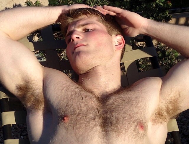 hairychest3:  Dad and son getting some sun.    “C'mon, son, no one’s around.