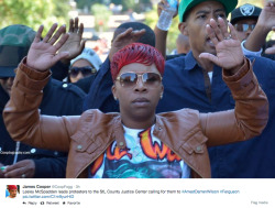 socialjusticekoolaid:   Today in Solidarity: Family of Mike Brown join protesters outside of STL Courthouse, demanding the immediate arrest of their son’s killer, Officer Darren Wilson.  The grand jury has yet to charge Darren Wilson with anything.